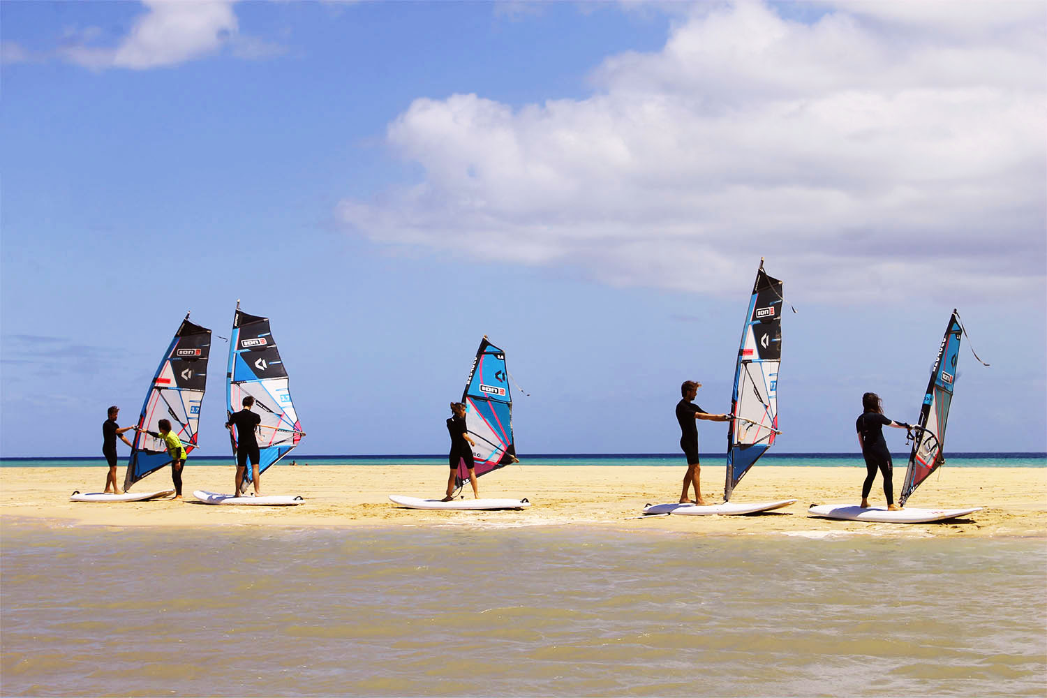 Windsurfer lesson on the beach in front of the ION CLUB Risco del Paso