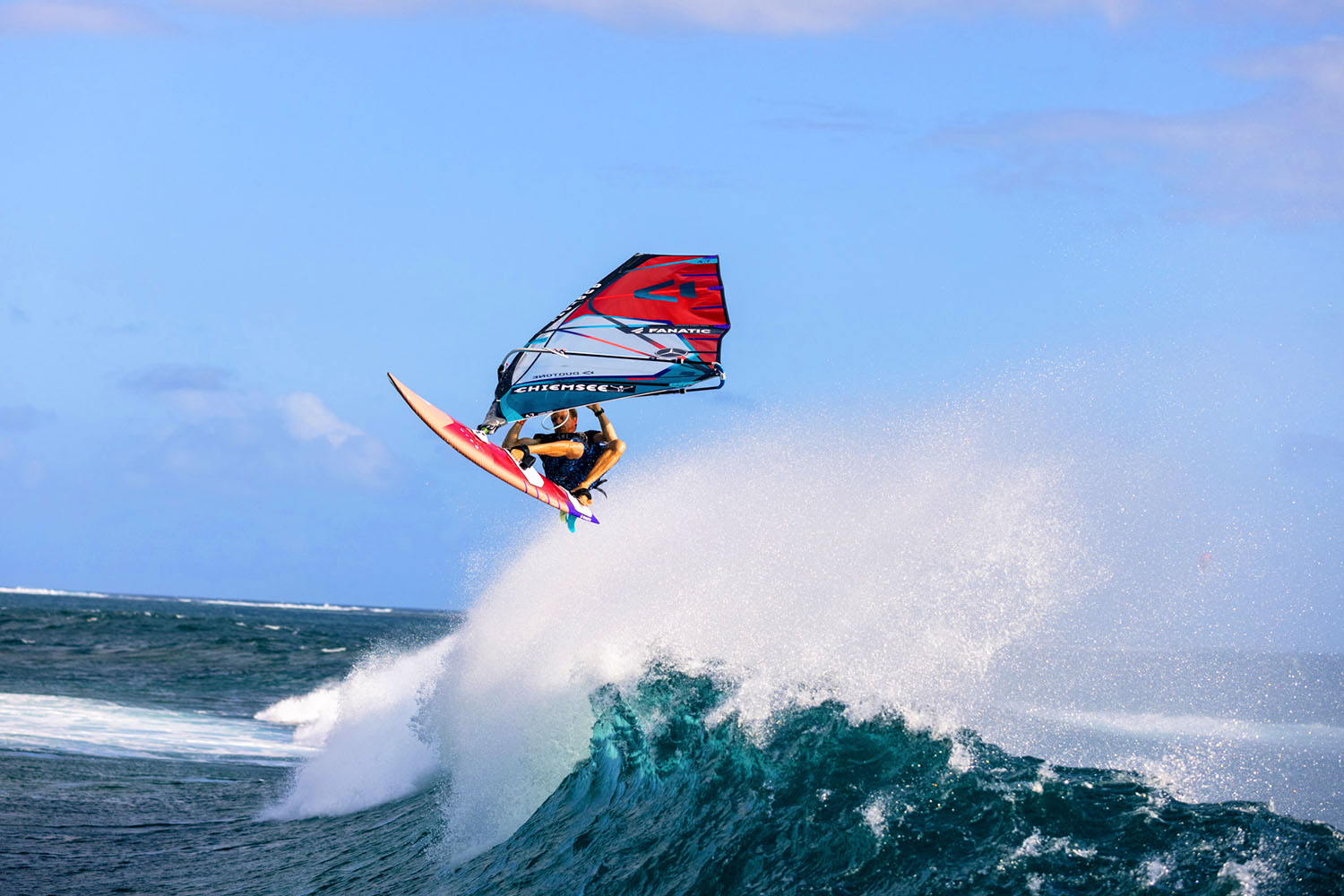 A windsurf on a wave in front of ION CLUB Mauritius Le Morne