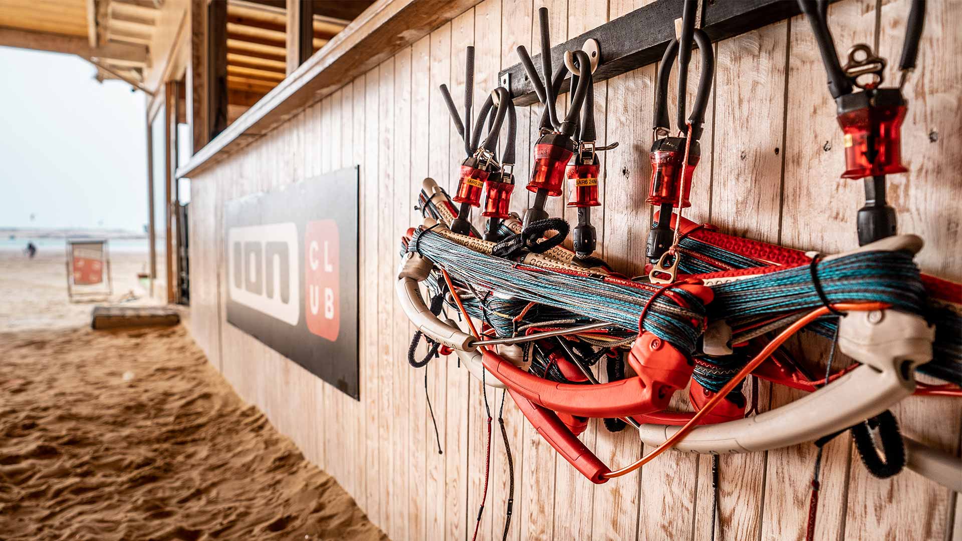 Ion-Club-Kitesurf-Dakhla-Lagoon-2022-2 Kite bars hung at the reception of Ion Club Dakhla Lagoon Center