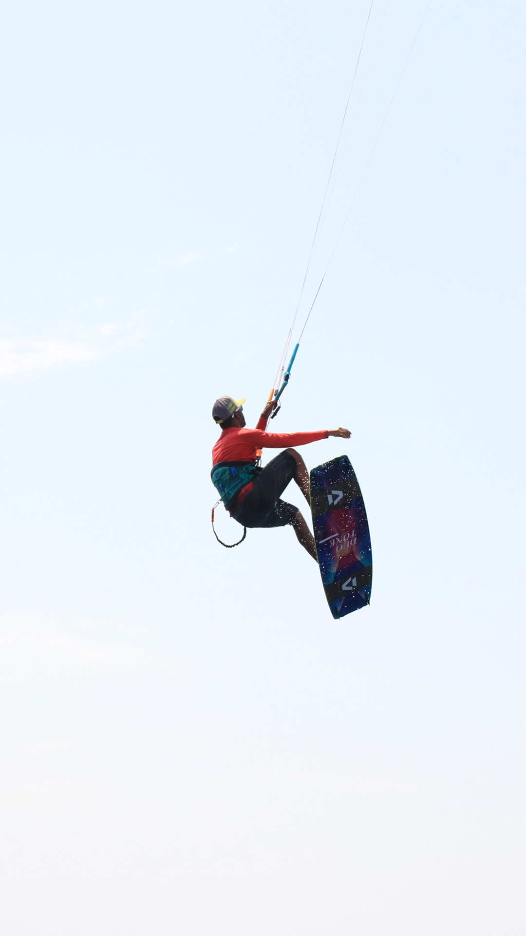 WEB-SITE-Kitesurfing-Ion-Club-Safaga-2022... A kitesurfing instructor has jumped out and is now flying over the clear blue sky in the waters of the Safaga spot.