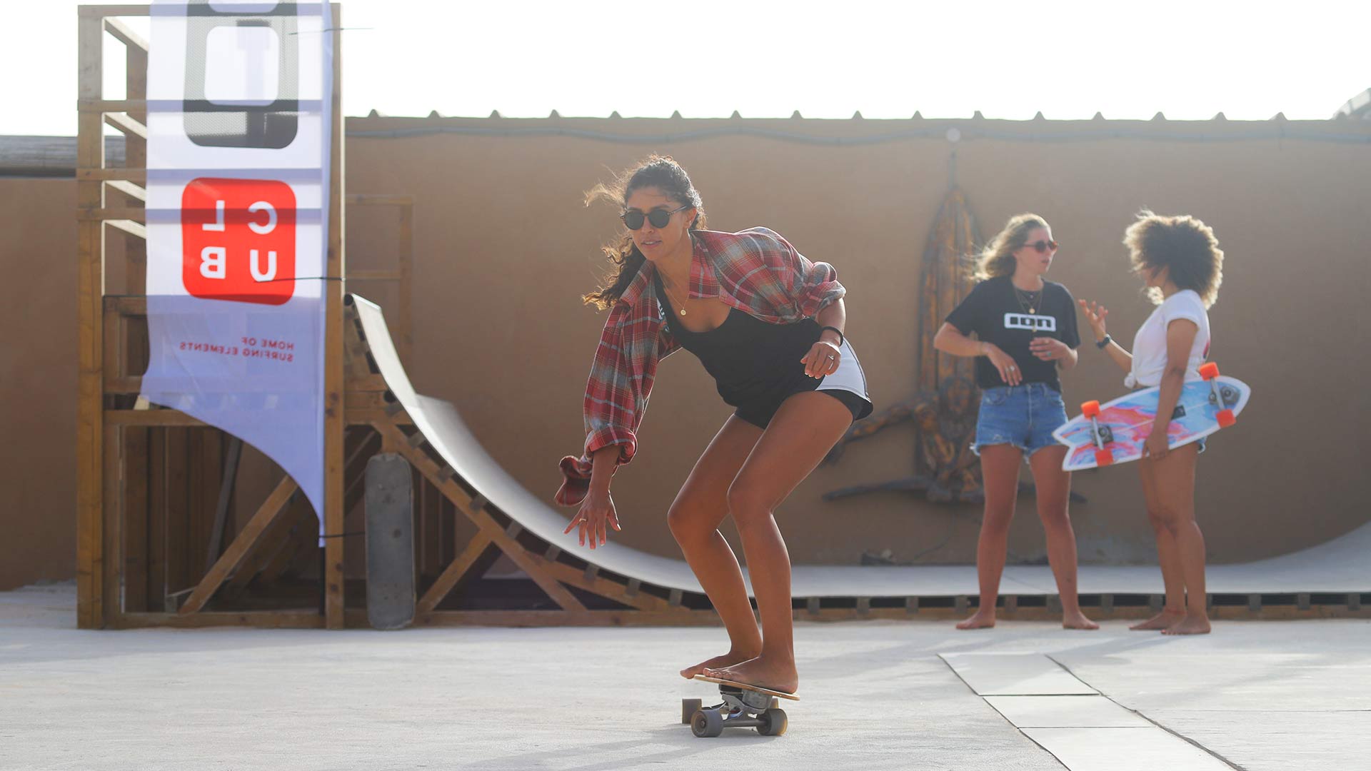 girls skating in a skatepark