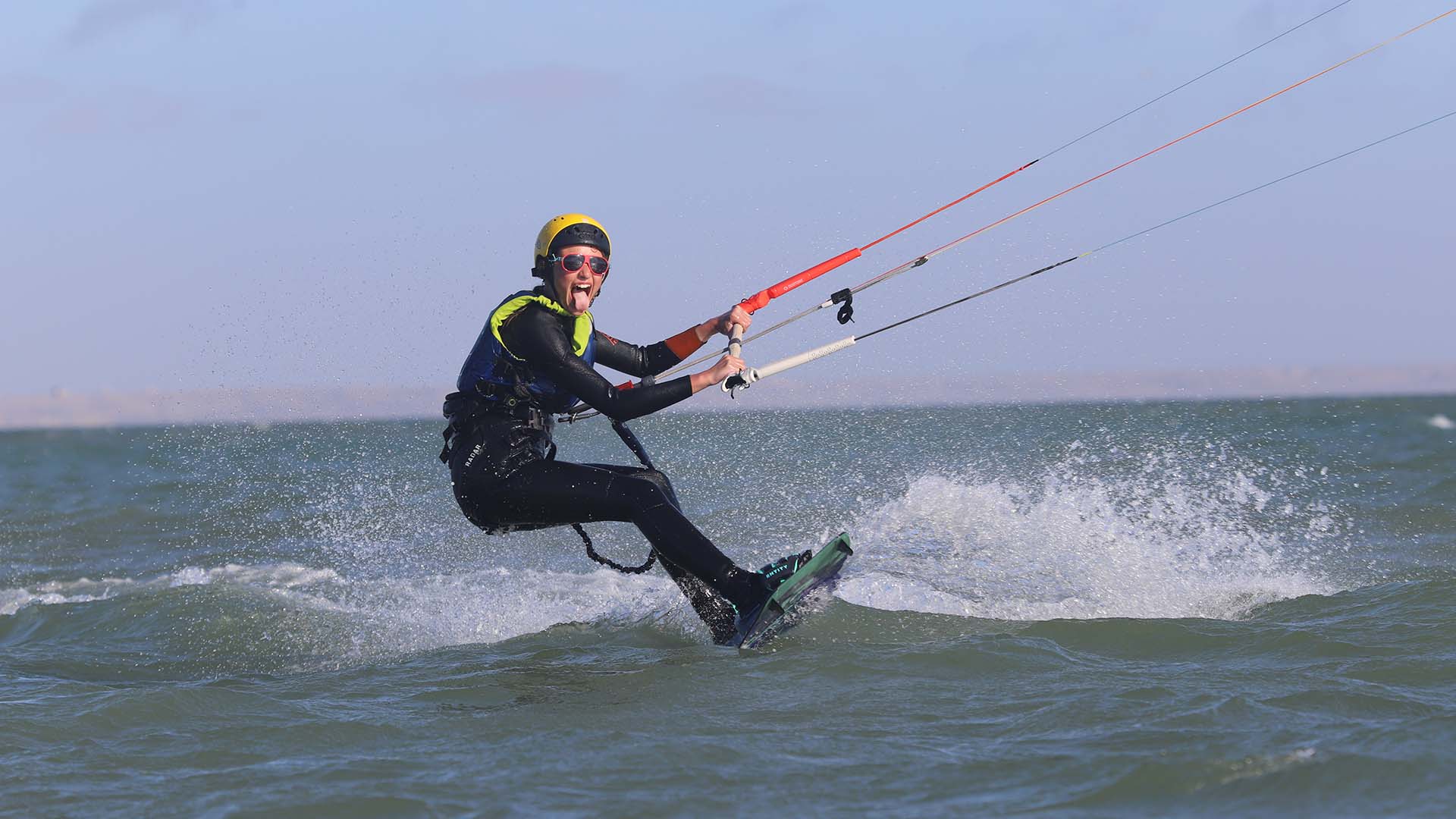 kitesurf lesson with a happy client