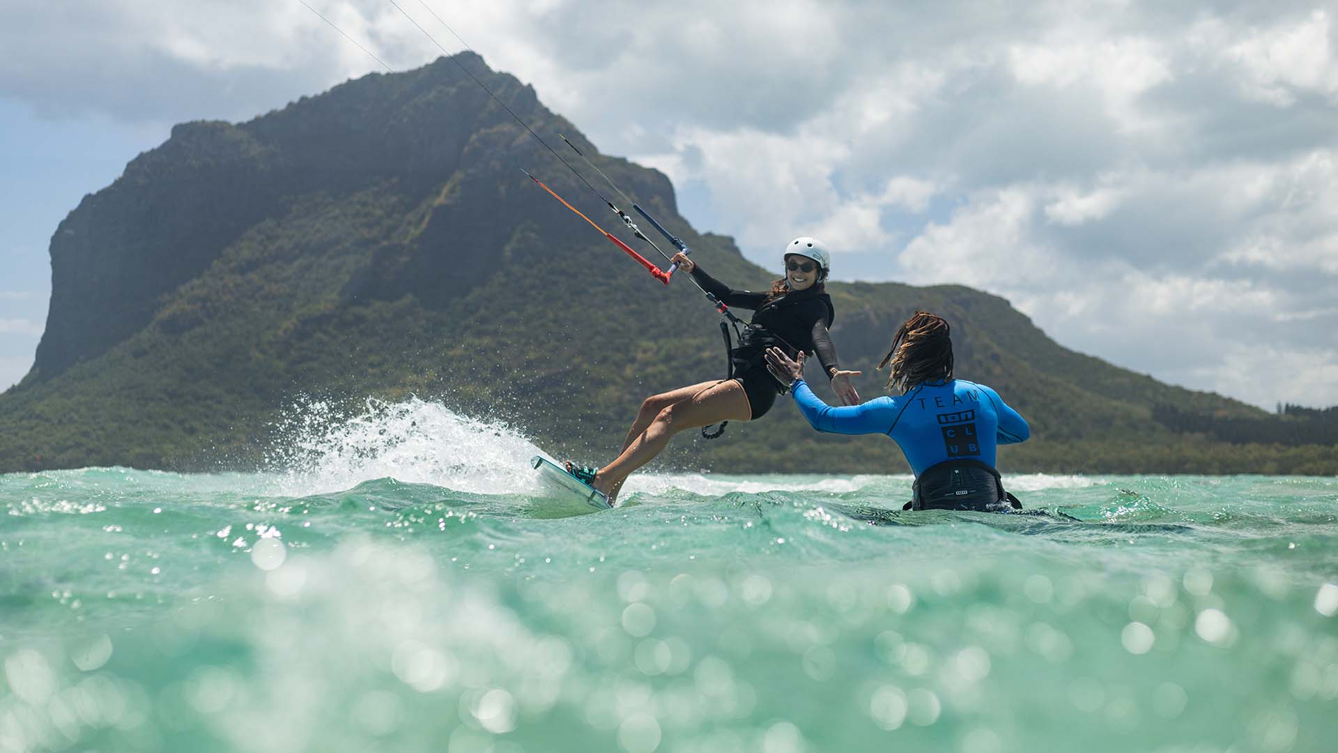 Kitesurfer lessons in turquoise water of le morne