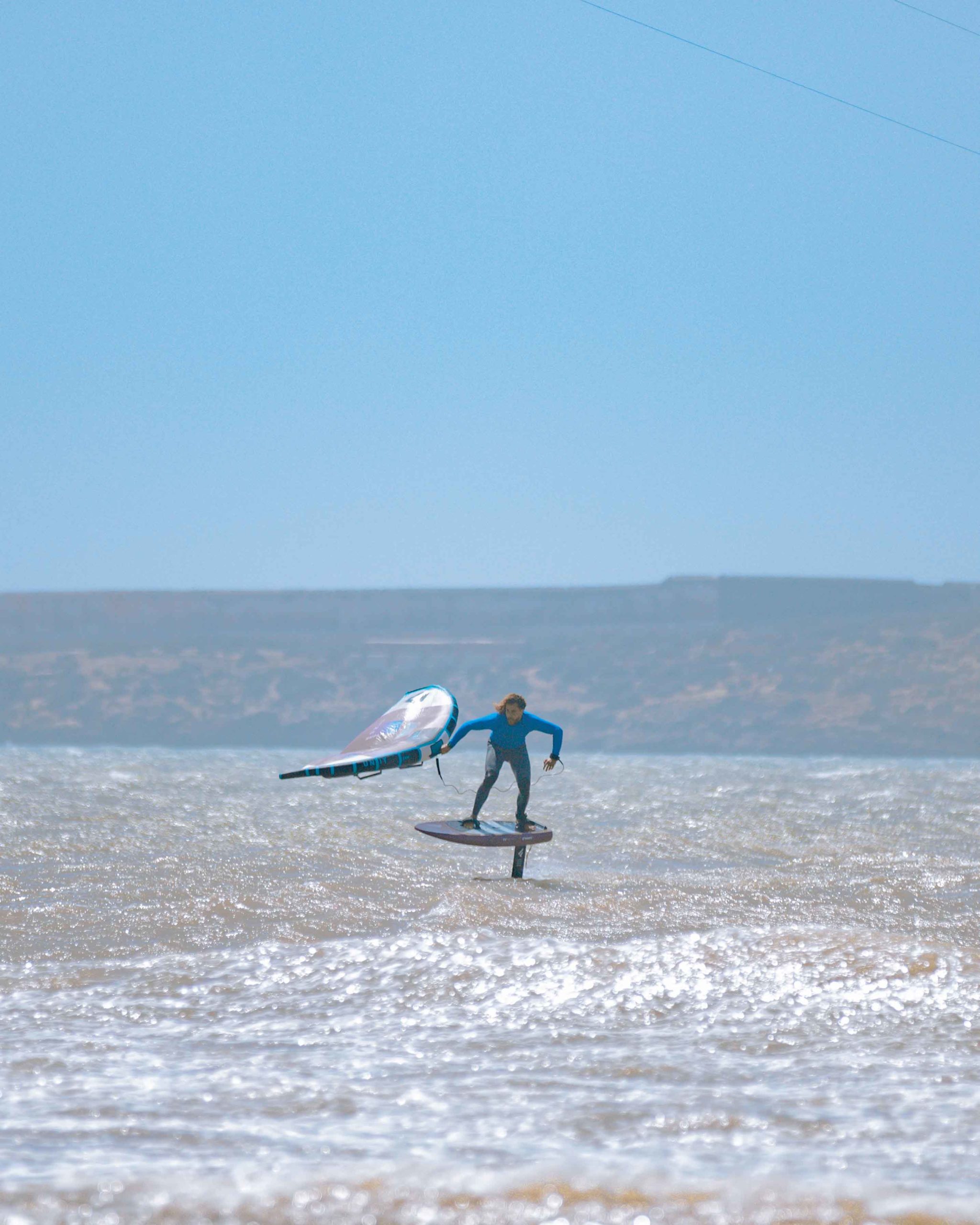 wingfoil in essaouira with blue sky