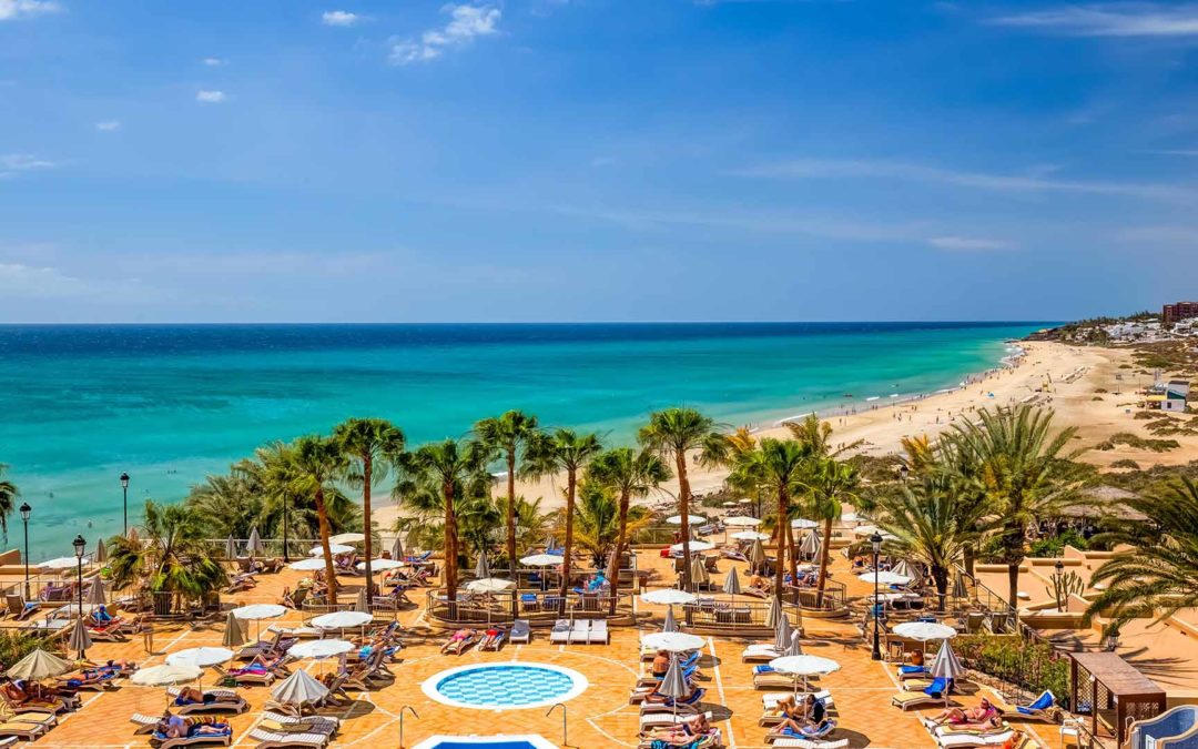 hotel view on the beach of fuerteventura with crystal clear water