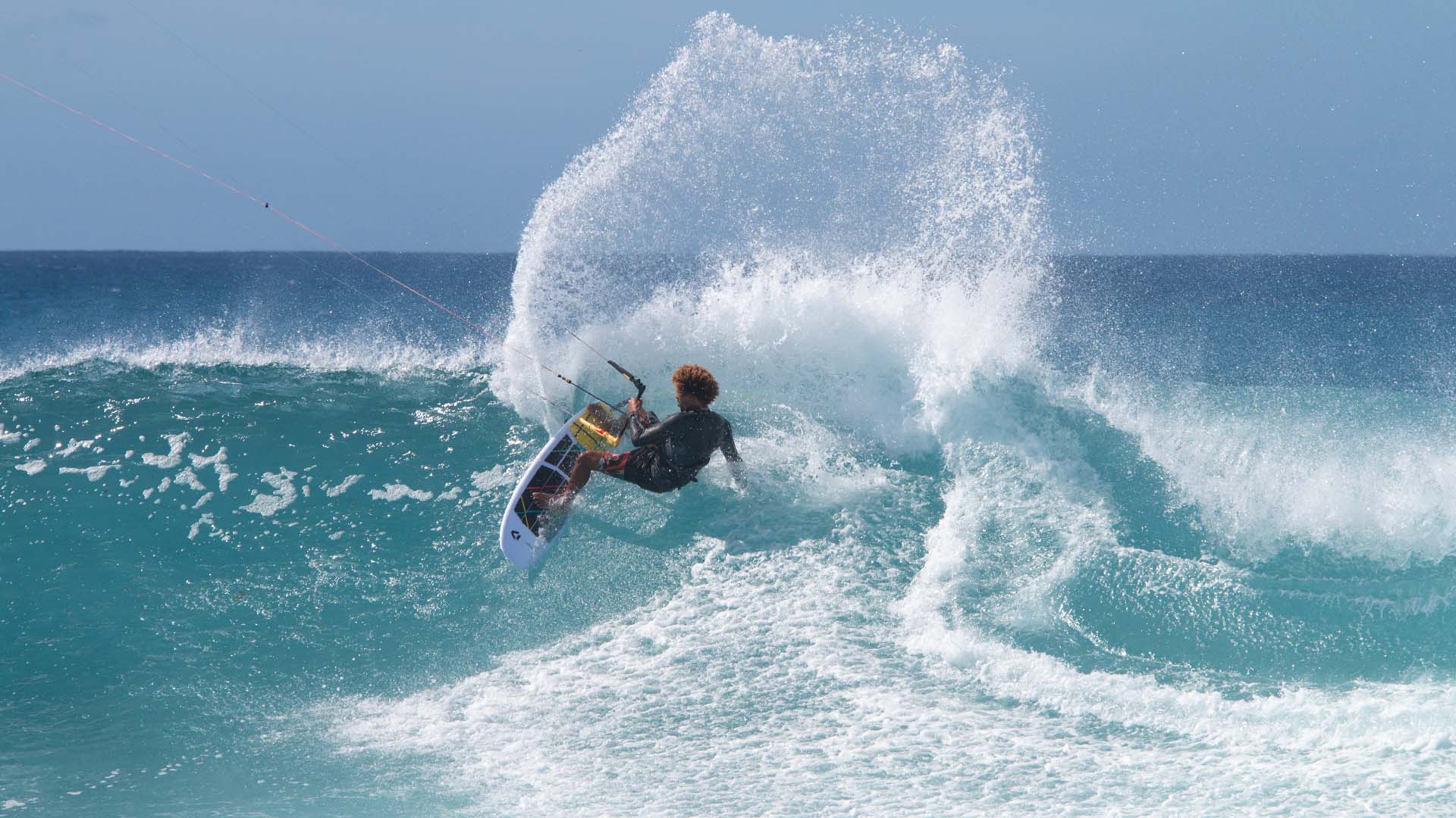 Woman student is learning how to stand up on the surf board