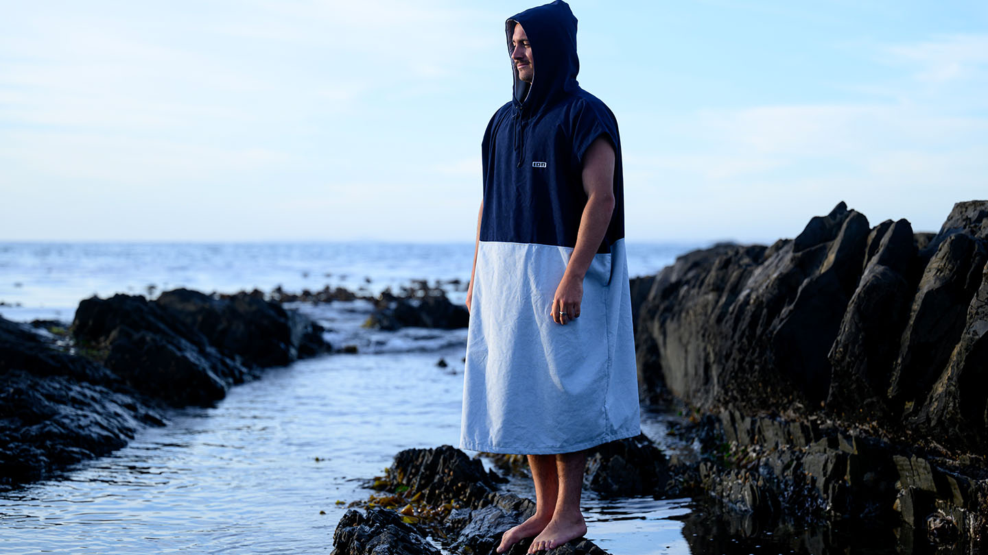 poncho with a men on the beach