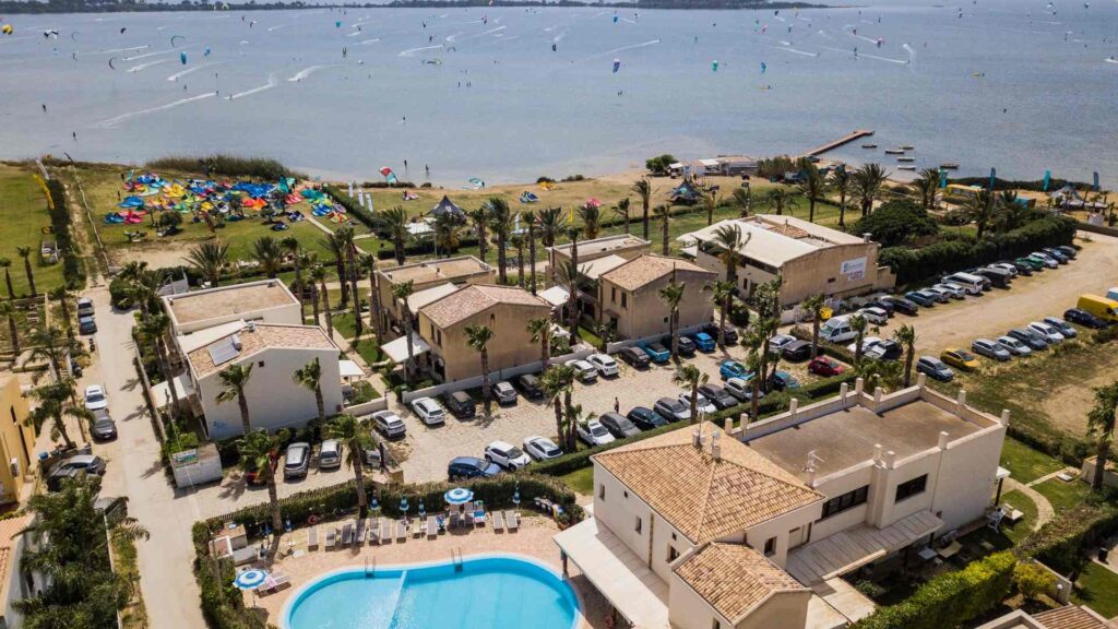 Resort Santa Maria waterfront on the Lo Stagnone lagoon at sunset, Sicily